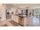 Spacious kitchen island featuring granite countertops and stainless steel appliances at 1031 August Sky Dr, Deltona, FL 32738