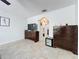 Bedroom with tile flooring, neutral walls, and an archway leading to other rooms at 10409 Laxton St, Orlando, FL 32824