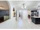 Bright dining area with arched doorways and tile flooring at 10409 Laxton St, Orlando, FL 32824