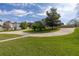 Expansive circular driveway surrounded by manicured green grass, offering ample space at 10919 Lakeshore Dr, Clermont, FL 34711