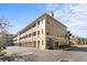 Exterior of building showing garages and covered walkways at 1221 Olmstead Blvd # 214, Celebration, FL 34747