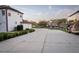 Wide concrete driveway next to a home, leading to a garage and RV parking area at 15350 Arabian Way, Montverde, FL 34756