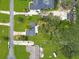 Aerial view of the neighborhood with lush trees and private driveways at 1710 Big Oak Ln, Kissimmee, FL 34746