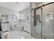 Modern bathroom featuring a soaking tub, stylish vanity and a glass-enclosed shower with rainfall showerhead at 1894 Valley Forge Dr, St Cloud, FL 34769