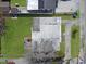 Aerial view of a single-story home with a large backyard and adjacent properties at 1921 N Forsyth Rd, Orlando, FL 32807