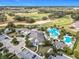 Large community pool and clubhouse set against a beautiful golf course, ideal for relaxation and entertainment at 2108 Antilles Club Dr, Kissimmee, FL 34747