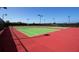 Two community tennis courts with green surfaces and red perimeters, available for residents and guests at 2292 Crofton Ave, Davenport, FL 33837