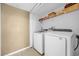 Convenient laundry room with modern washer and dryer at 241 Cranbrook Dr, Kissimmee, FL 34758