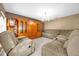 Comfortable living room with tile flooring and a display cabinet at 241 Cranbrook Dr, Kissimmee, FL 34758