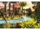 Scenic lazy river winding through lush tropical landscaping, offering a relaxing and refreshing water adventure at 2471 Dubai St, Kissimmee, FL 34747