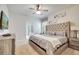 Comfortable main bedroom featuring king size bed, dresser, and TV at 2471 Dubai St, Kissimmee, FL 34747