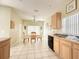 Spacious dining room with tile flooring and natural light at 2577 Aster Cove Ln, Kissimmee, FL 34758