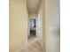 Hallway leading to bedroom at 2577 Aster Cove Ln, Kissimmee, FL 34758