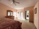 Spacious main bedroom offering a view of the en-suite bathroom and outdoor access to the backyard at 2577 Aster Cove Ln, Kissimmee, FL 34758