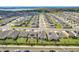 An aerial view of a neighborhood showcasing the uniformity and community layout at 281 Piave St, Haines City, FL 33844