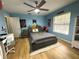 Bedroom decorated with a Ninja Turtle theme and gray flooring at 3285 Majestic Oak Dr, St Cloud, FL 34771