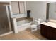 Bathroom featuring a tub, shower, and sleek vanity, providing a relaxing space at 3470 Goldeneye Ln, St Cloud, FL 34772