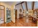 Hallway with hardwood floors, vaulted ceilings, and decorative accents at 4318 Oak Ct, St Cloud, FL 34769