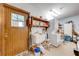 Practical laundry room with sink, shelving, and washer/dryer at 4318 Oak Ct, St Cloud, FL 34769