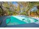 Screened-in pool area with lush landscaping and relaxing atmosphere at 4318 Oak Ct, St Cloud, FL 34769