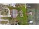 Aerial view of a lakeside property, showing the house outline and private boat dock at 4815 Cypress Dr, Lake Wales, FL 33898