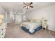 Bright bedroom with neutral carpet, ceiling fans and multiple windows at 4815 Cypress Dr, Lake Wales, FL 33898