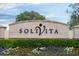 Entrance sign to Solivita community with landscaping in the foreground at 484 Villa Park Rd, Kissimmee, FL 34759