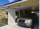 A grey SUV is parked in the carport of this single Gathering residence at 492 Prestwick Pl # 2, Kissimmee, FL 34759