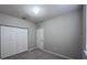 This is a bedroom featuring a double door closet and door to exit at 501 Terrace Ridge Cir # 501, Davenport, FL 33896