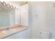 Well-lit bathroom with a large mirror and a shower with glass doors at 5025 Wellington Park Cir # 68, Orlando, FL 32839