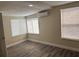 View of a bedroom with new floors and lots of natural light at 610 Illinois Ave, St Cloud, FL 34769