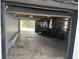 Open garage view showing the large storage space inside at 610 Illinois Ave, St Cloud, FL 34769