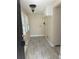 This laundry room has tile flooring, a window, and a utility sink at 610 Illinois Ave, St Cloud, FL 34769