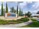 Attractive community signage welcomes residents and guests at 7622 Oakmoss Loop, Davenport, FL 33837