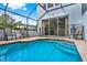 Private pool, lanai with seating offers a perfect outdoor space at 7682 Fitzclarence St, Kissimmee, FL 34747