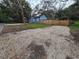 Large fenced yard offers privacy and outdoor space, complemented by a storage shed at 7709 Bell Blvd, Orlando, FL 32810