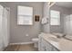 Neutral bathroom with a shower and tub, and natural light from the window at 7761 Tosteth St, Kissimmee, FL 34747