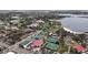 Panoramic aerial view showcasing the property's proximity to nearby park, tennis courts and lake at 802 S 10Th St, Haines City, FL 33844