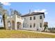 Charming exterior featuring a stucco facade, arched windows, and a classic Mediterranean tile roof at 802 S 10Th St, Haines City, FL 33844