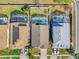 Aerial view of single-Gathering homes each with a screened-in pool and fenced back yard at 8103 Yellow Crane Dr, Kissimmee, FL 34747