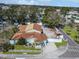 Charming home featuring a metal roof, a white picket fence, and a well-manicured front yard at 901 W Donegan Ave, Kissimmee, FL 34741