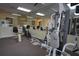 Community gym area featuring cardio machines and weightlifting equipment at 991 Lake Berkley Dr, Kissimmee, FL 34746