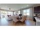 Bright and airy dining area connected to the living room, great for entertaining at 1123 Olivine Ave, Dundee, FL 33838