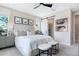 Bedroom featuring an en suite bathroom with a sliding barn door and modern decor at 1139 Olivine Ave, Dundee, FL 33838