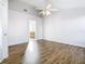 Inviting bedroom featuring a fan and wood-look flooring at 12622 Earnest Ave, Orlando, FL 32837