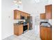 Spacious kitchen with stainless steel appliances, ample cabinetry, and tile flooring at 12622 Earnest Ave, Orlando, FL 32837