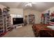 Bright bedroom with vaulted ceiling, carpet flooring, and built-in shelving at 1695 Horseshoe Rd, Enterprise, FL 32725