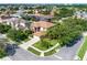 Aerial view of home showcasing neighborhood, landscaping, well maintained lawn, and overall curb appeal at 214 Farrington Ln, Kissimmee, FL 34744