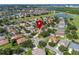 Aerial view of home showcasing neighborhood, landscaping, well maintained lawn, and overall curb appeal at 214 Farrington Ln, Kissimmee, FL 34744