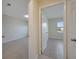 View of two bedrooms with tile flooring through open doorways, highlighting the layout at 2416 Swailes Dr # 8, Orlando, FL 32837